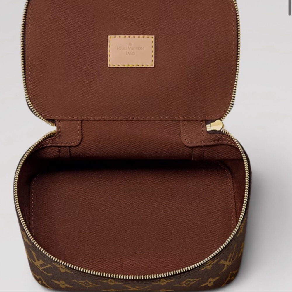 Brand new authentic rare and collectible Louis  Vuitton travel cube with zipper.